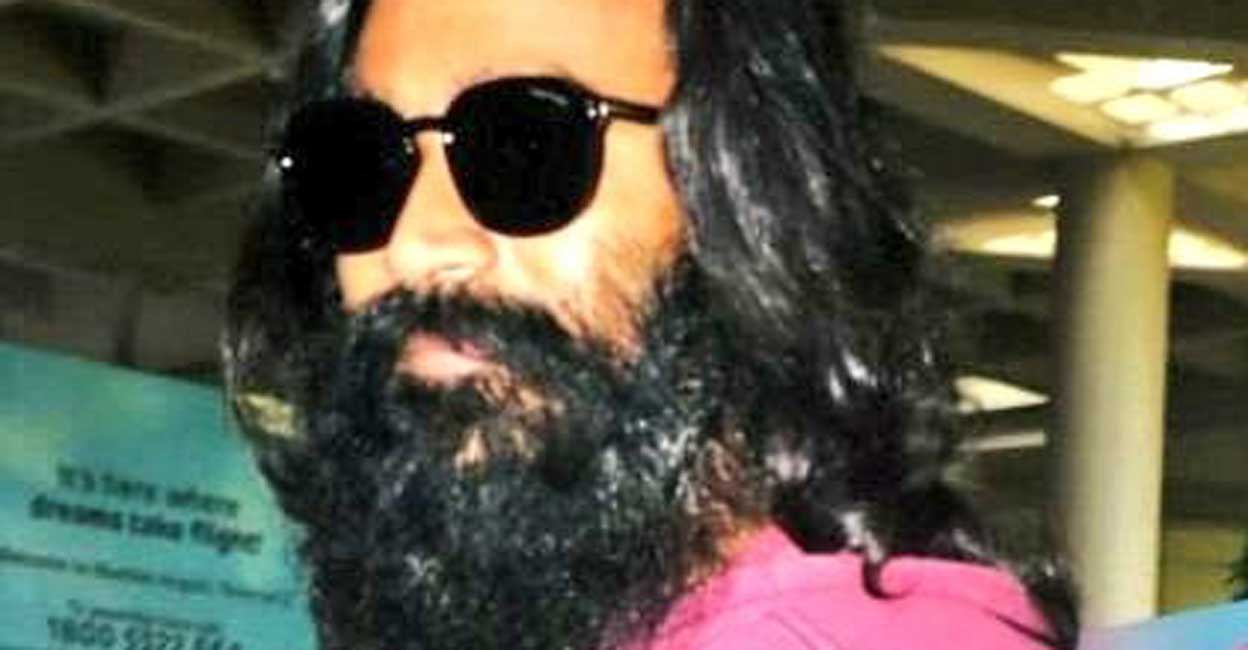 Dhanush's airport style makeover leaves fans in awe: Resemblance to Baba Ramdev?