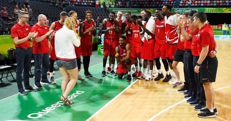 English basketball player proposes to girlfriend on court
